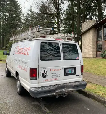 Chimney sweep Portland service van on the way to provide expert cleaning.